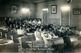 Classroom at Bangor HS with students & faculty, 1910