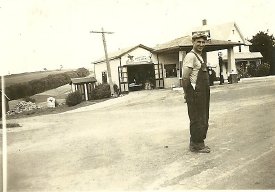 Hank Klos in front of gas station