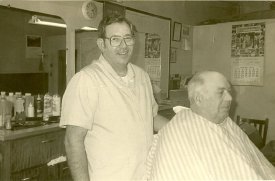 Ray Horstman cutting hair,  circa 1989